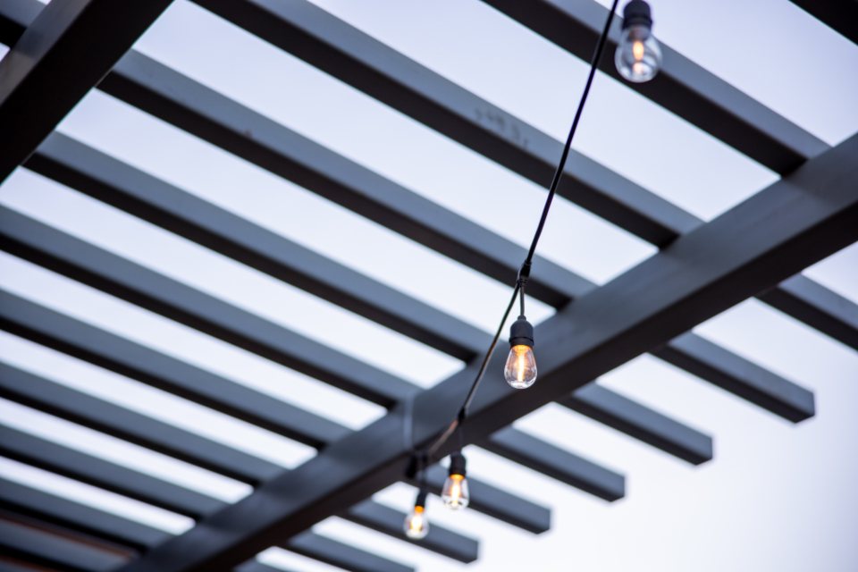 Timber pergola with festoon lights